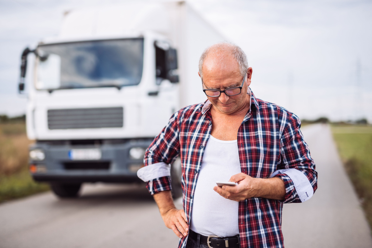 Person On Phone Next To Truck